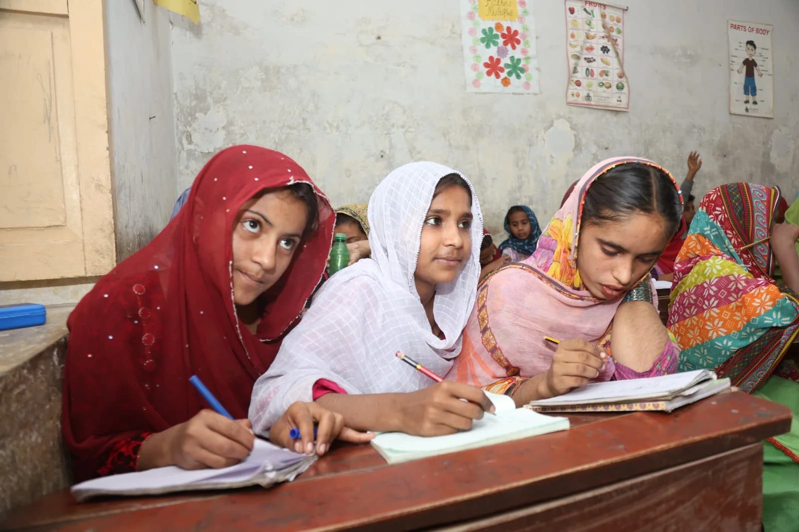 Students receiving free tuition support at Suhaai
